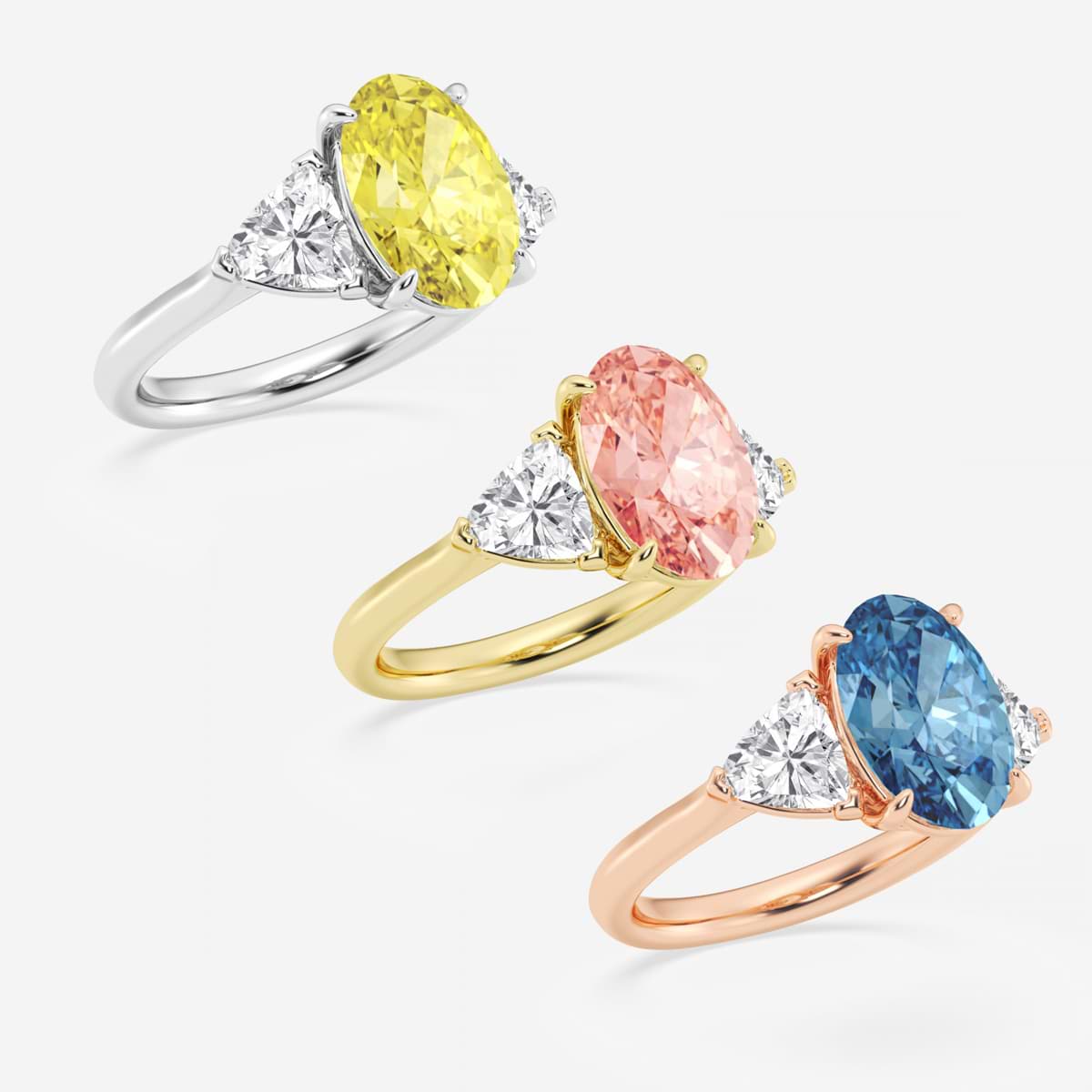 Charon Fancy Blue Oval Diamond Three Stone Ring
