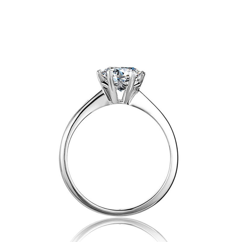 The Serpentine Embrace Round Diamond Solitaire with Bypass Shank & Heart Prongs