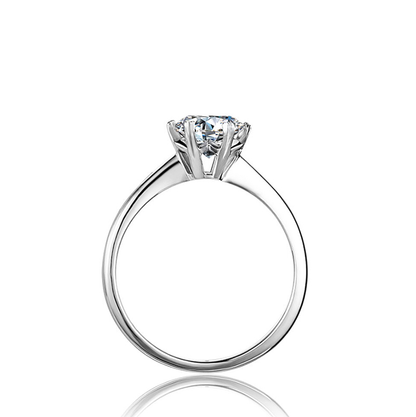 The Serpentine Embrace Round Diamond Solitaire with Bypass Shank & Heart Prongs