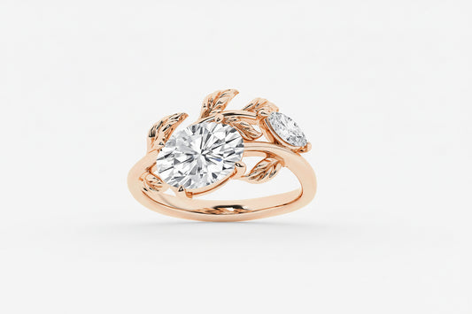 Rose gold ring with diamond on a white background