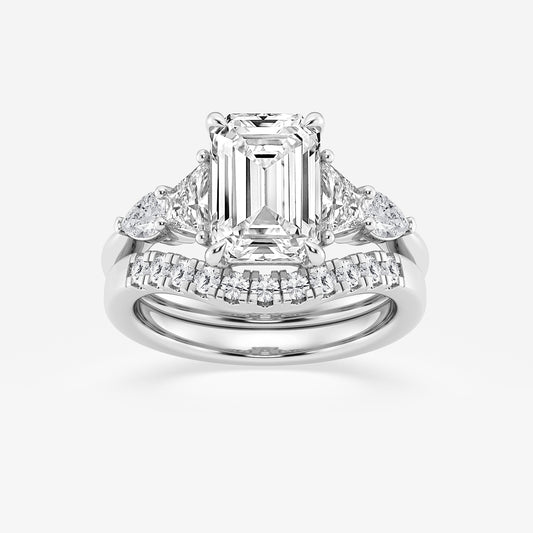 Diamond ring with emerald-cut center stone on a white background