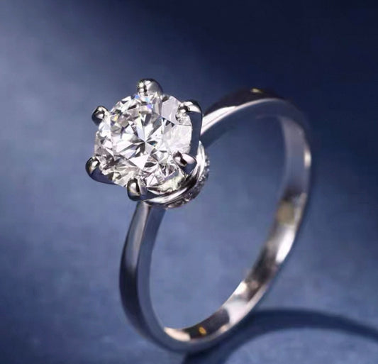 The Celestial Solitaire Round Diamond Six-Prong Ring with Hidden Halo