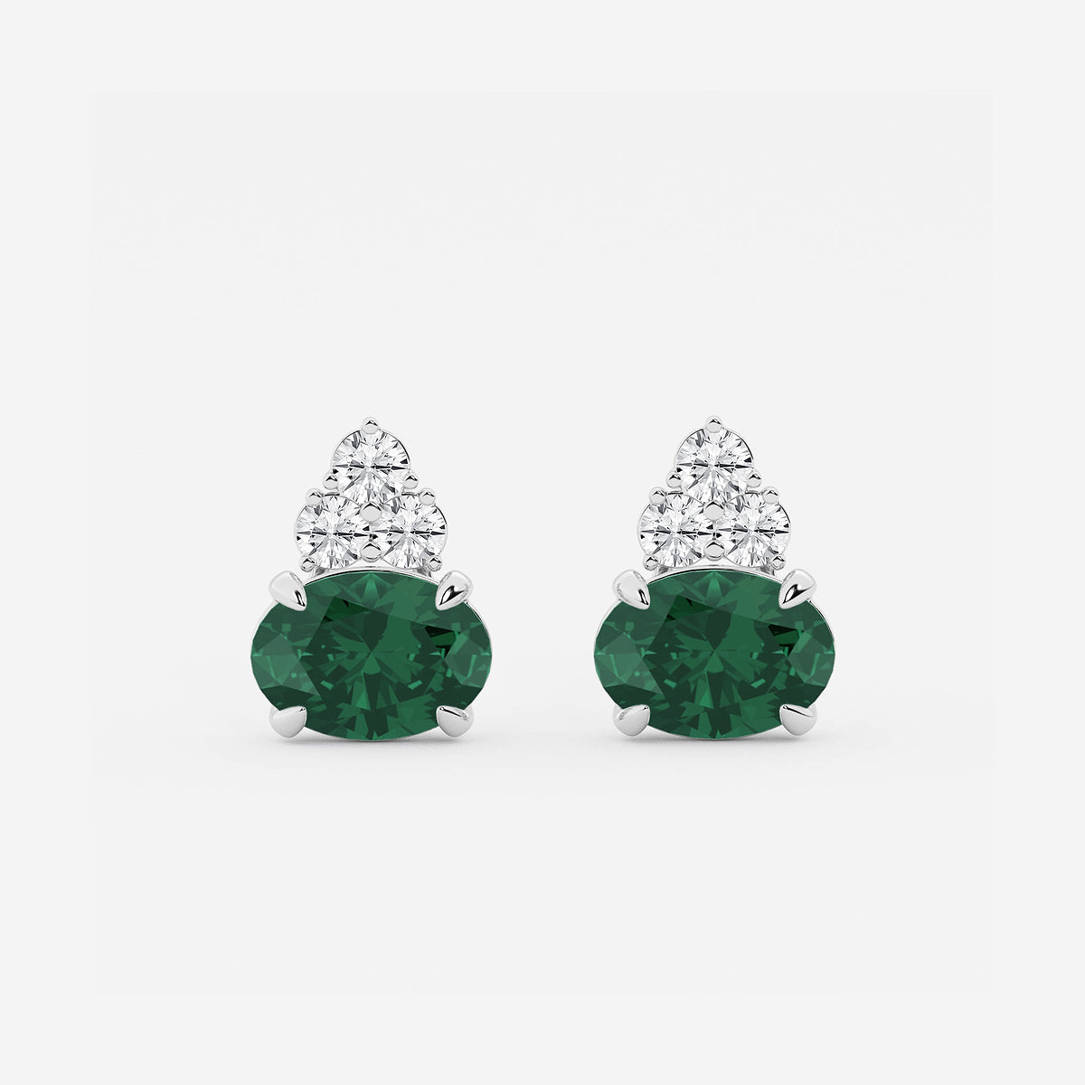 10.7x7.49mm East-West Oval Cut Created Emerald with 3/4 ctw Round Lab Grown Diamond Cluster Earrings    14K White Gold