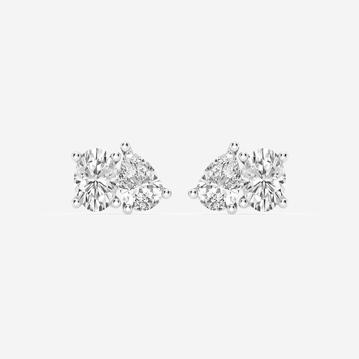 1 1/2 ctw Toi Et Moi Oval and Pear Stud Earrings    Platinum, E, VS1| IGI Certified