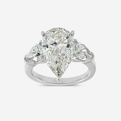 Diamond ring with three pear-shaped diamonds