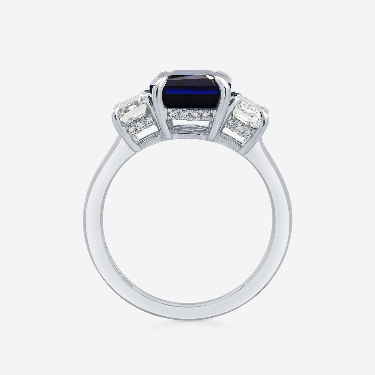 Freesia Emerald Cut Sapphire Three Stone Ring with Round Diamonds