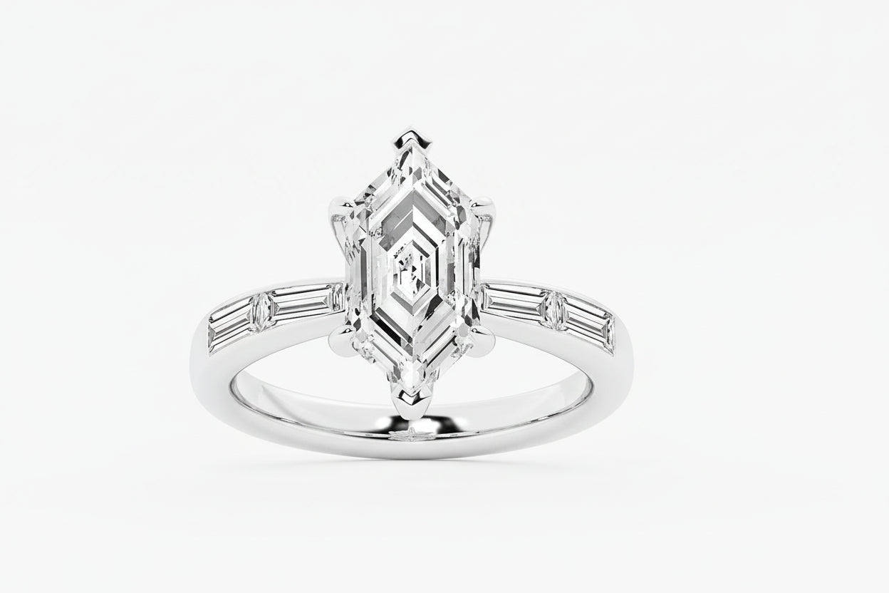 Diamond ring with a central princess-cut diamond and baguette side stones on a white background