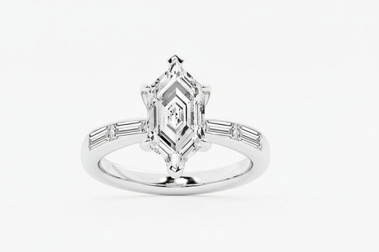 Diamond ring with a central princess-cut diamond and baguette side stones on a white background