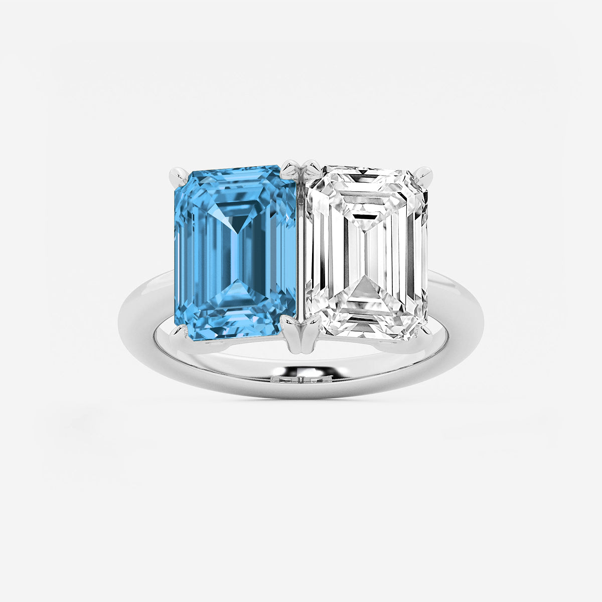Ring with emerald-cut blue and clear gemstones