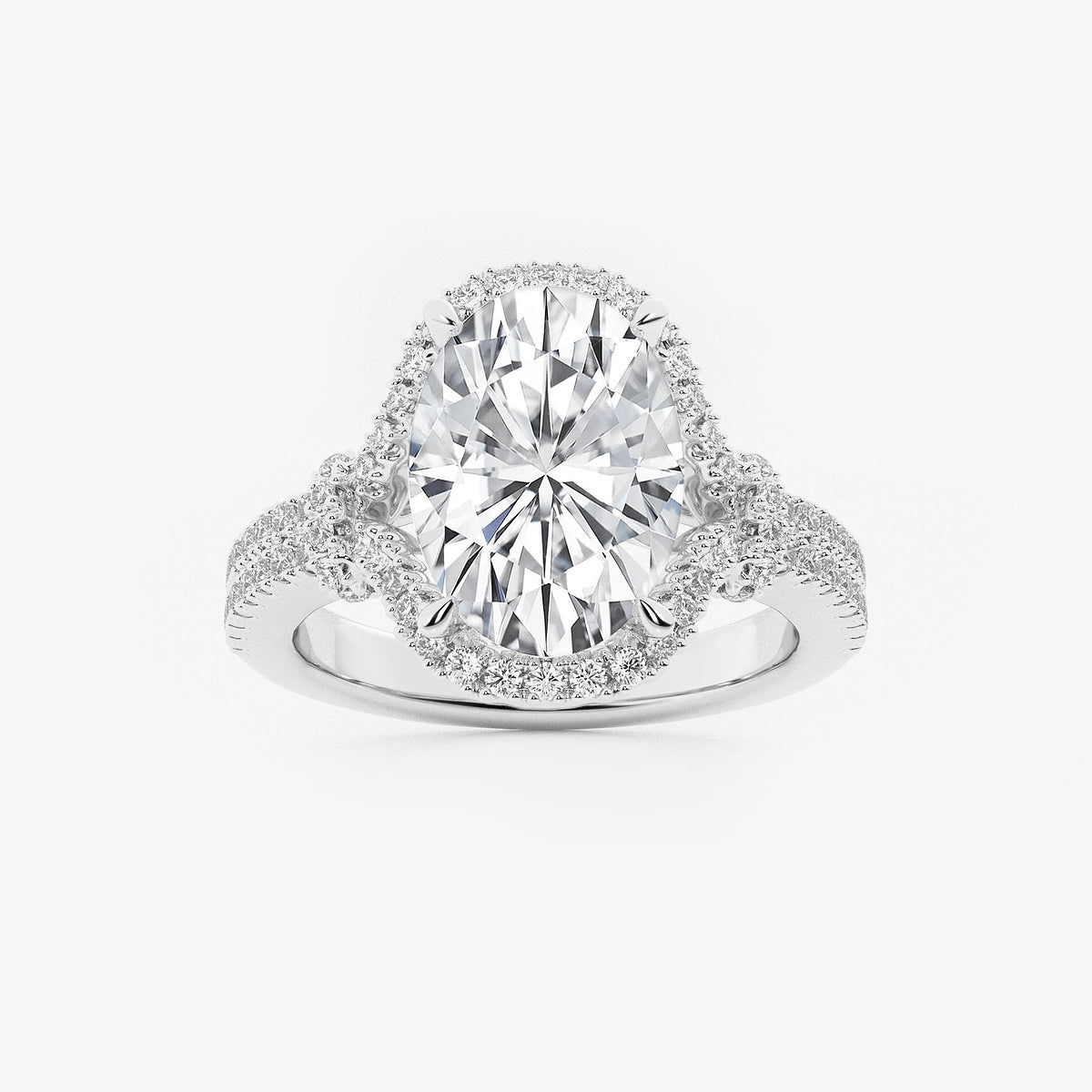 Sara Oval Diamond Side Stone Engagement Ring