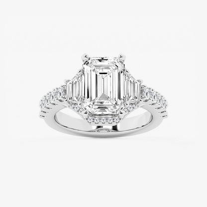 Diamond ring with emerald-cut center stone and smaller diamonds on a white background