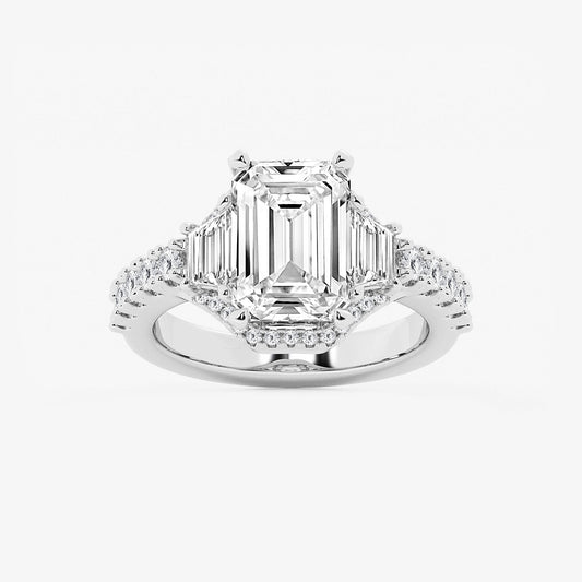 Diamond ring with emerald-cut center stone and smaller diamonds on a white background