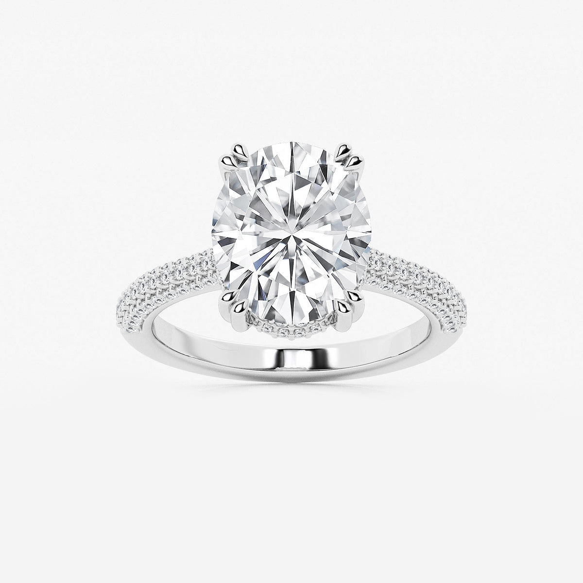 Diamond ring with a large central gemstone and smaller stones on a white background