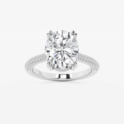 Diamond ring with a large central gemstone and smaller stones on a white background