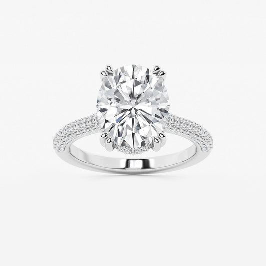 Diamond ring with a large central gemstone and smaller stones on a white background