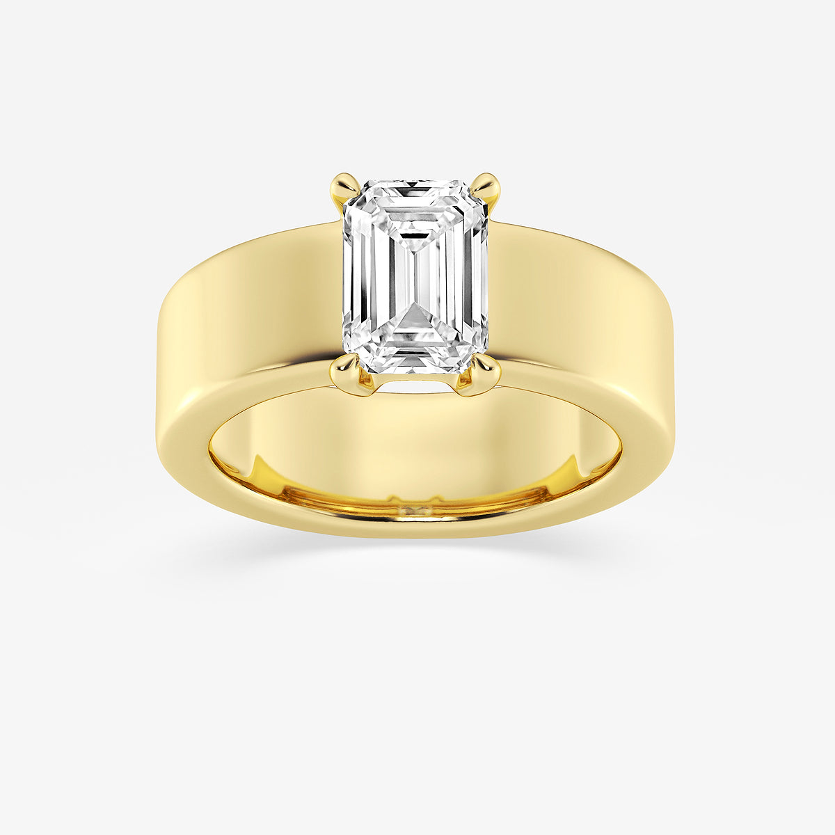 Gold ring with a large diamond on a white background
