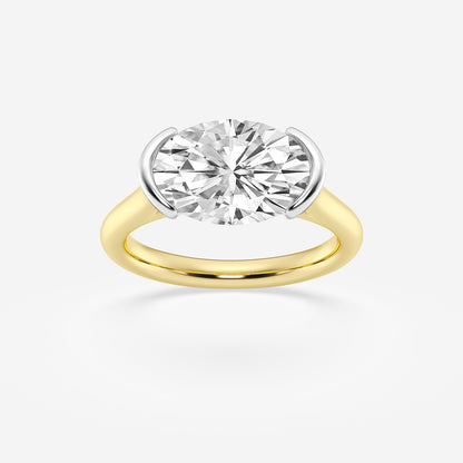 Gold ring with a large diamond on a white background