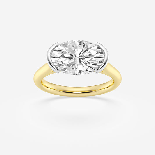 Gold ring with a large diamond on a white background