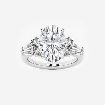 Diamond ring with three diamonds on a white background