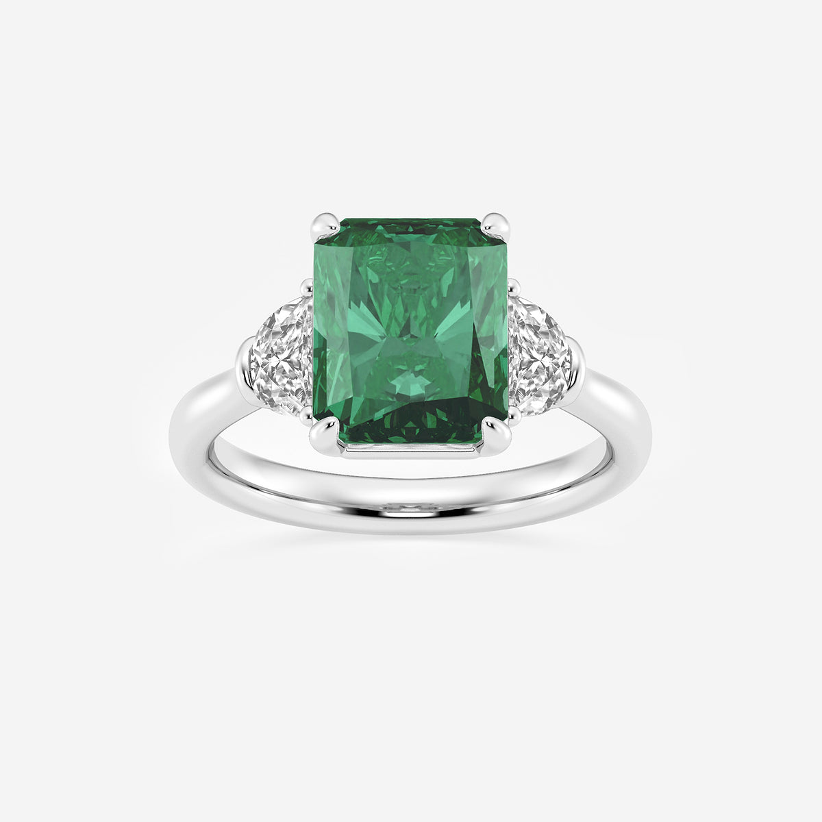 Ring with a green gemstone and diamond accents on a white background