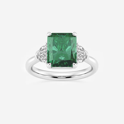 Ring with a green gemstone and diamond accents on a white background