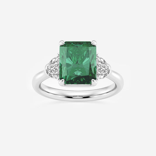 Ring with a green gemstone and diamond accents on a white background