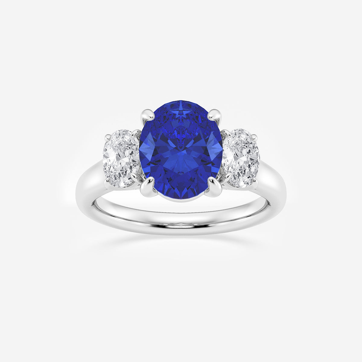 Ring with a blue gemstone and diamond accents on a white background