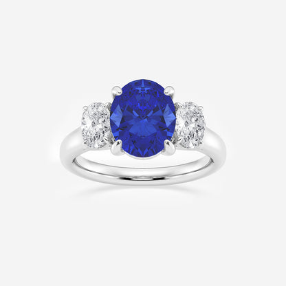 Ring with a blue gemstone and diamond accents on a white background