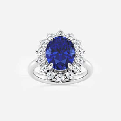 Silver ring with a blue gemstone and diamond accents on a white background