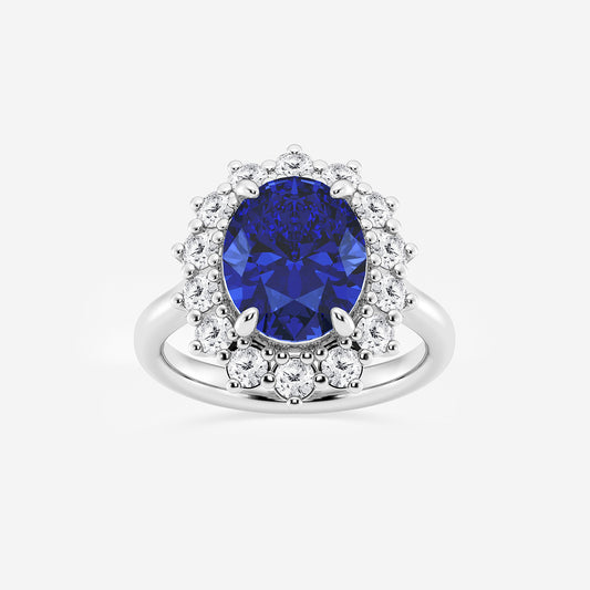 Silver ring with a blue gemstone and diamond accents on a white background