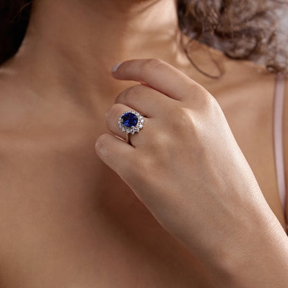 Petunia Oval Sapphire Halo Ring with Round Diamonds