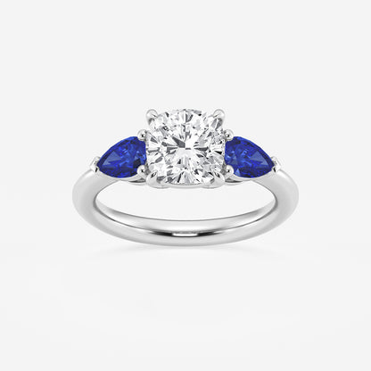Diamond ring with blue sapphires on a white background