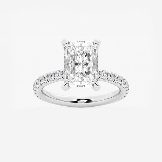 Diamond ring with a central gemstone and smaller stones on a white background