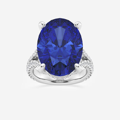 Ring with a blue gemstone and diamond-studded band on a white background