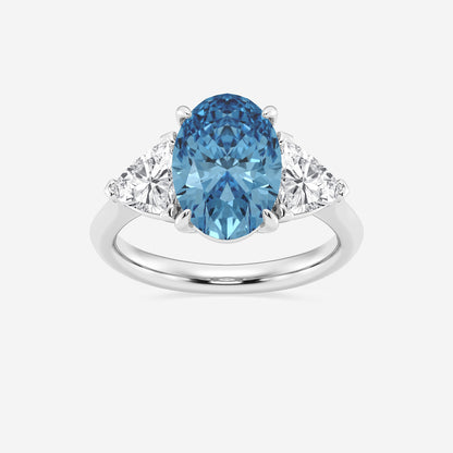 Ring with a blue gemstone and diamond accents on a white background