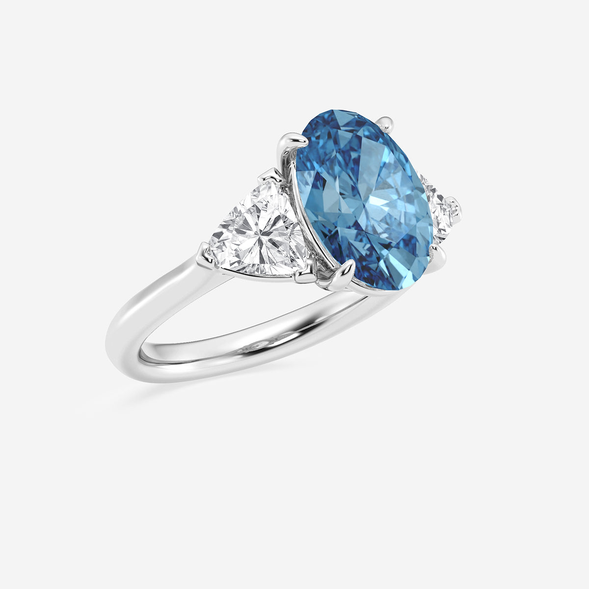 Charon Fancy Blue Oval Diamond Three Stone Ring