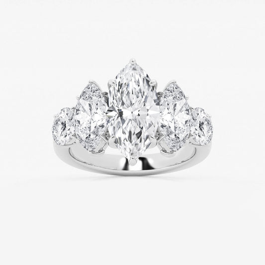Diamond ring with pear-shaped stones on a white background