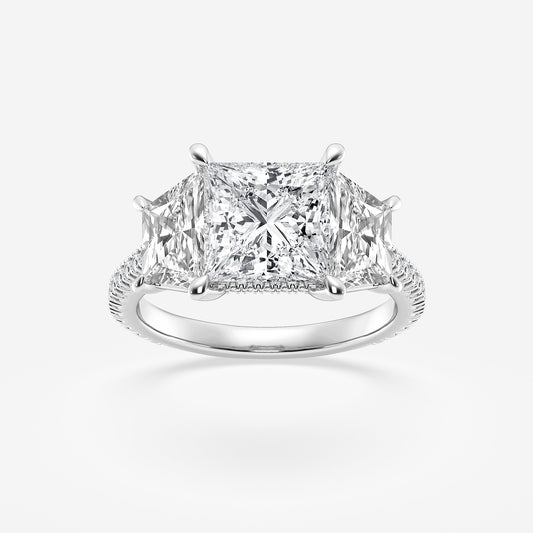 Diamond ring with a princess-cut center stone on a white background