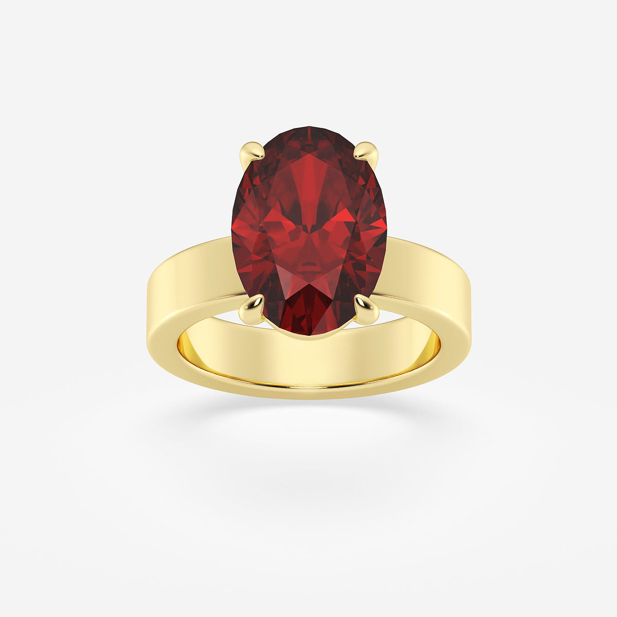 Gold ring with a red gemstone