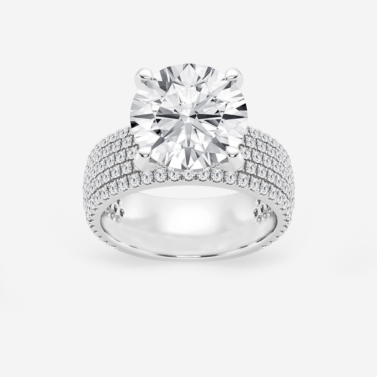 Diamond ring with multiple rows of diamonds on a white background