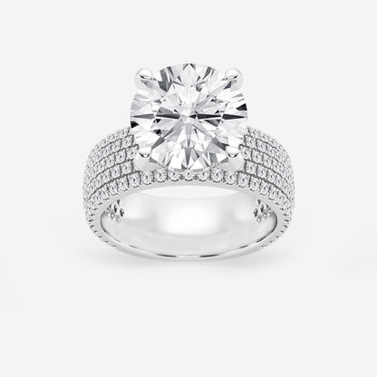 Diamond ring with multiple rows of diamonds on a white background