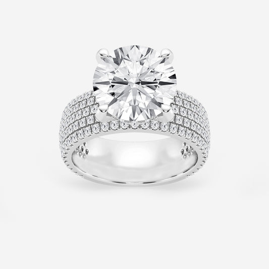 Diamond ring with multiple rows of diamonds on a white background
