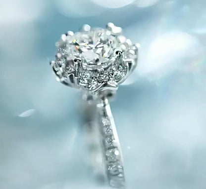 The Petal Glow Floral Halo Engagement Ring with Pavé Diamond Shoulders