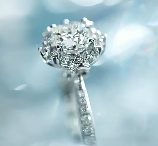 The Petal Glow Floral Halo Engagement Ring with Pavé Diamond Shoulders